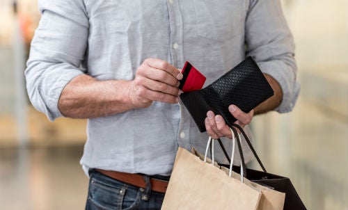 Man goes shopping with his credit card