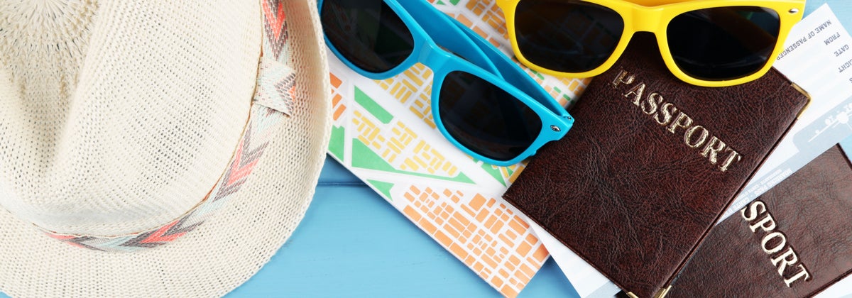 Sunglasses, hats and passports - holiday essentials