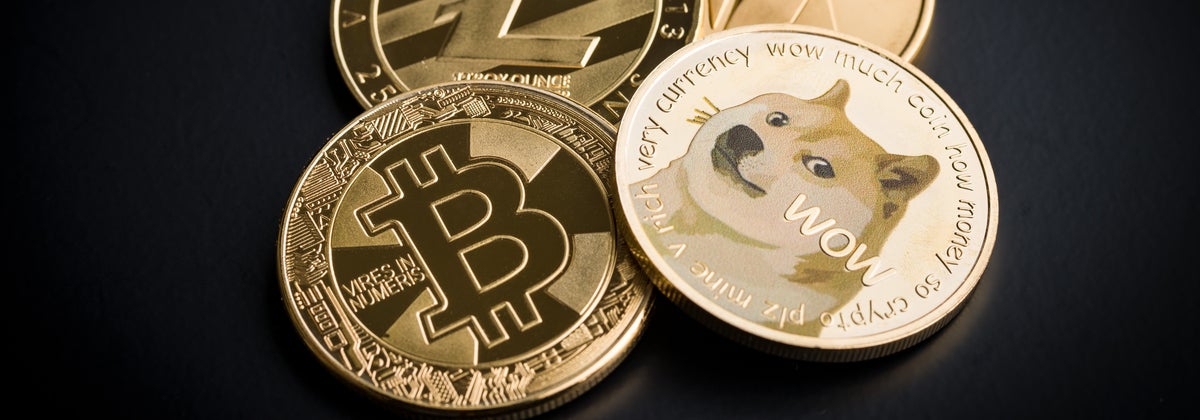 Symbol of Bitcoin and Dogecoin