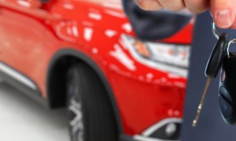 Close up of Car Dealer holding keys